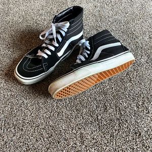 Black and white high top Van sneakers